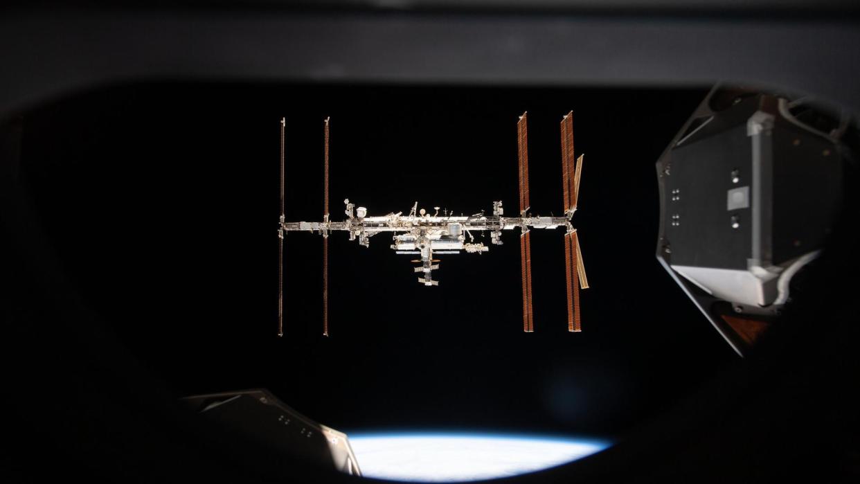  International space station seen through a spacecraft window. 