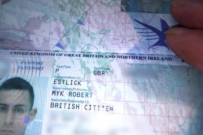 The ink stain on Myk's passport