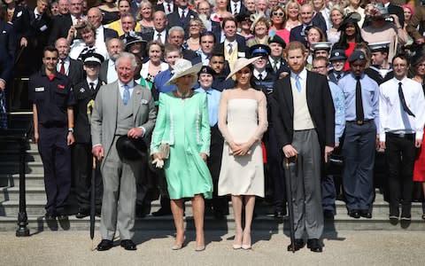 Guests pose for a photograph as they attend The Prince of Wales' 70th Birthday Patronage Celebration held at Buckingham Palace  - Credit: PA