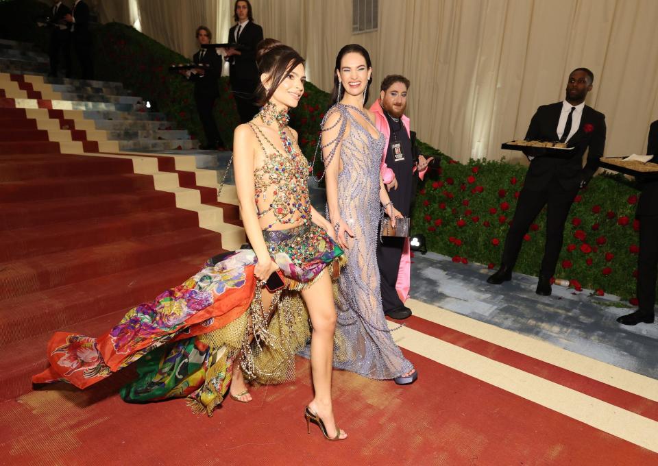 Emily Ratajkowski and Lily James leave the Met Gala together on May 2, 2022.
