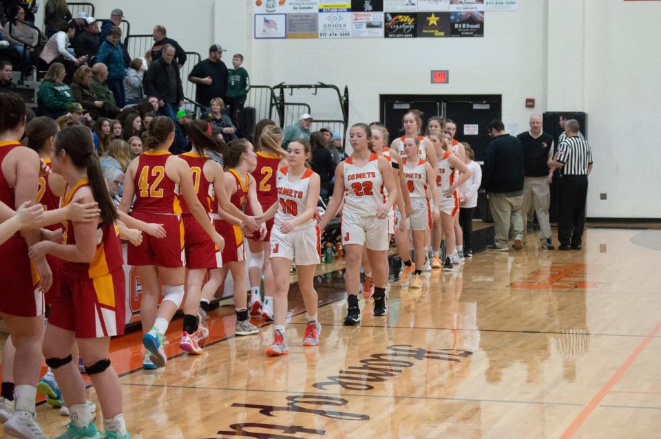 Jonesville congratulates Reading after their 38-31 victory over the Comets.