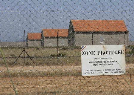 A placard which reads "protected area, do not enter without authorization" is seen at a military base in the southern French town of Miramas, near Marseille, France July 7, 2015. REUTERS/Philippe Laurenson