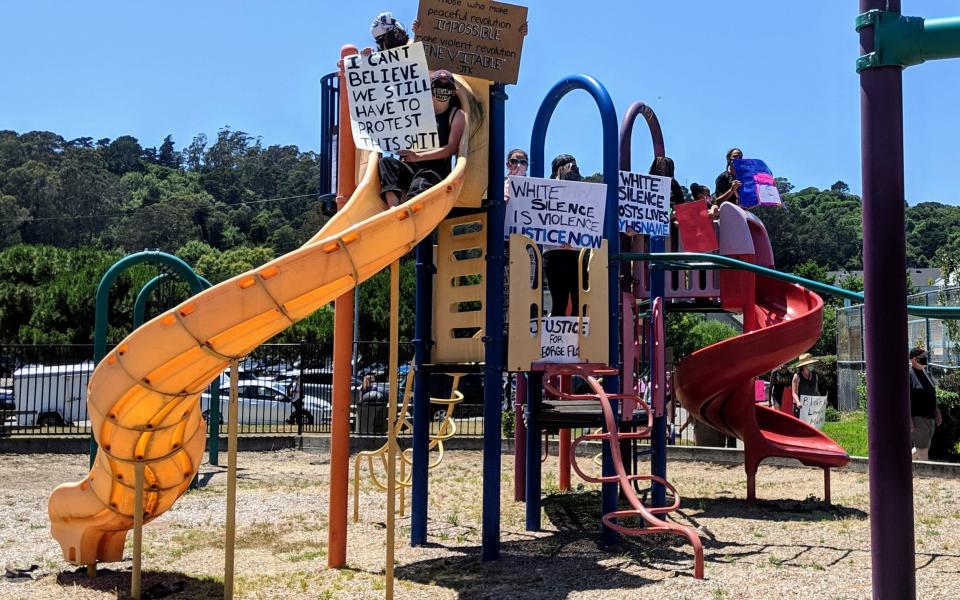 Children join a peaceful protest in Marin City, population 3,000, after the killing of George Floyd