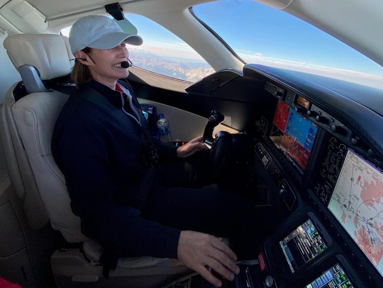 Laura Schmuzter flying a Jet It private plane