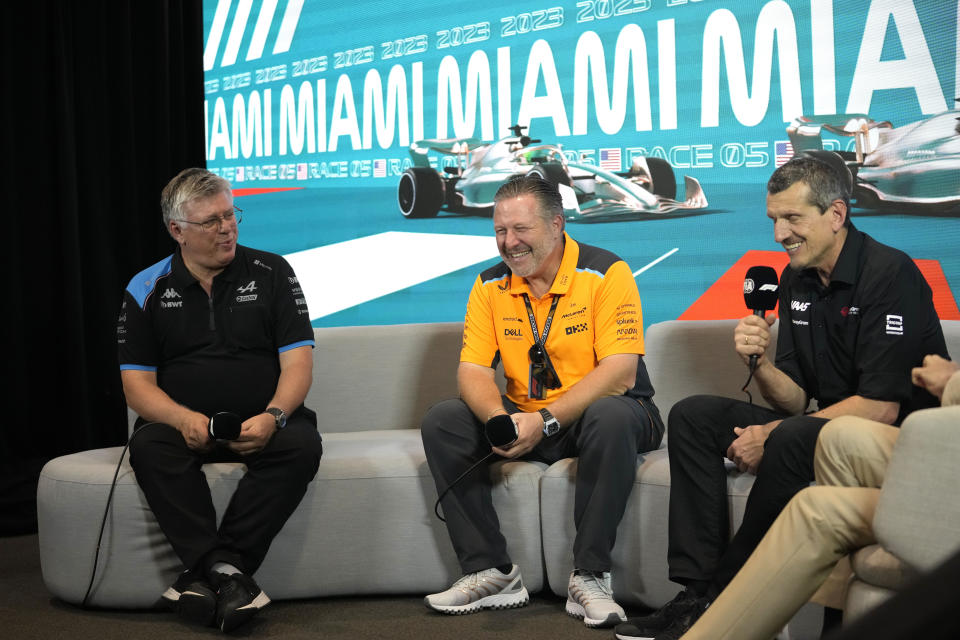 Alpine team principal Otmar Szafnauer, left, McLaren CEO Zak Brown, center, and Haas team principal Guenther Steiner, right, attend a news conference ahead of the Formula One Miami Grand Prix auto race, Friday, May 5, 2023, at the Miami International Autodrome in Miami Gardens, Fla. (AP Photo/Lynne Sladky)