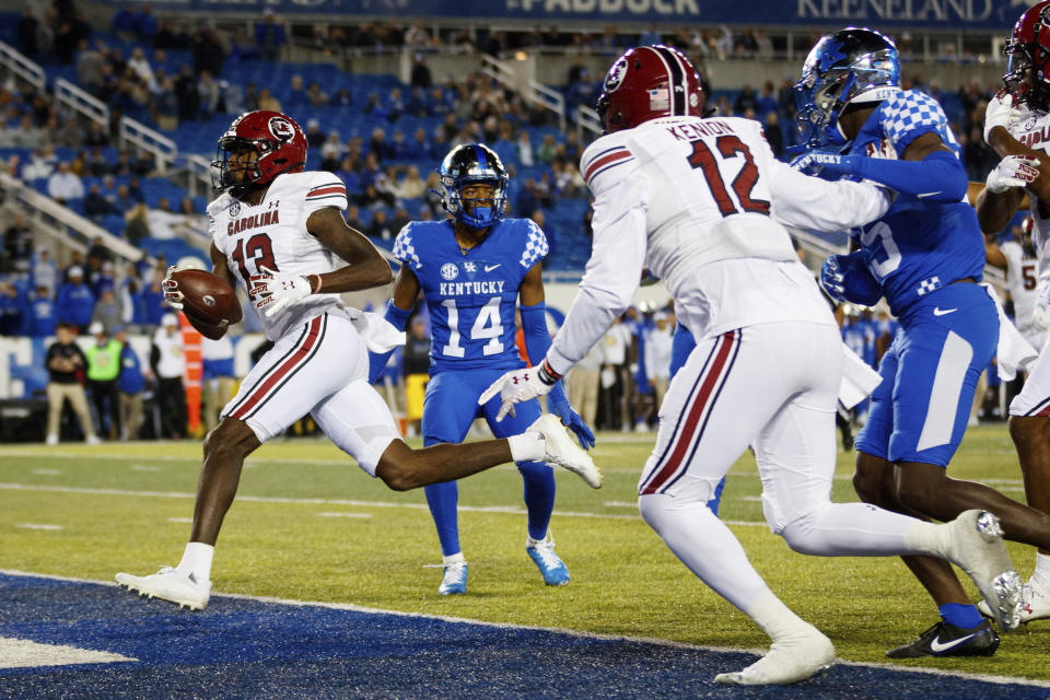 South Carolina wide receiver Jalen Brooks (13) runs the ball into the end zone for a touchdown against Kentucky during the second half of an NCAA college football game in Lexington, Ky., Saturday, Oct. 8, 2022. (AP Photo/Michael Clubb)