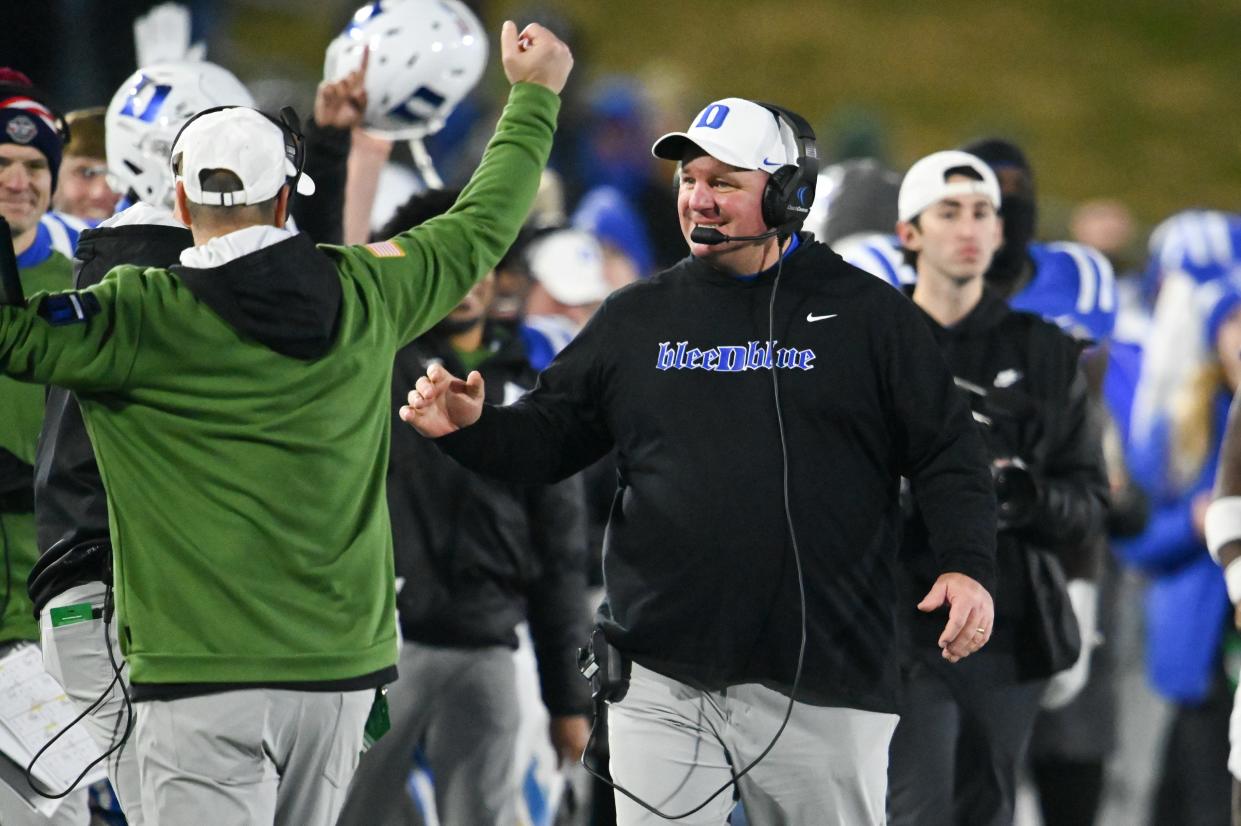 Duke coach Mike Elko reacts after an interception against Central Florida during the second half in the 2022 Military Bowl at Navy-Marine Corps Memorial Stadium.