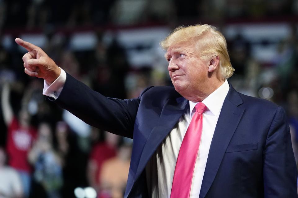 Former President Donald Trump points to the crowd as he arrives to speak at a Save America rally Friday, July 22, 2022, in Prescott, Ariz. (AP Photo/Ross D. Franklin)