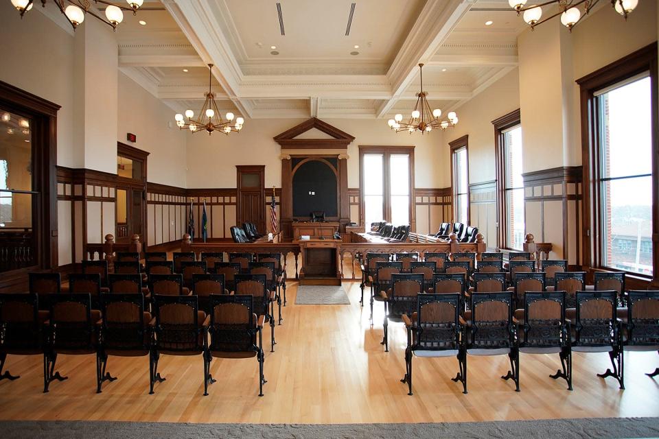 The courthouse&#39;s courtroom, which is now the county commission chambers, has a restored, coffered ceiling and some windows that have been reopened. This photo was taken from where a conference room used to be, but that wall was removed to open up the space. A video monitor will be mounted behind the commission chairman&#39;s desk.