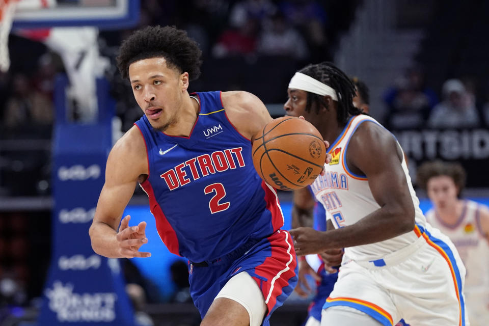 Detroit Pistons guard Cade Cunningham drives up court during the first half of an NBA basketball game against the Oklahoma City Thunder, Monday, Dec. 6, 2021, in Detroit. (AP Photo/Carlos Osorio)