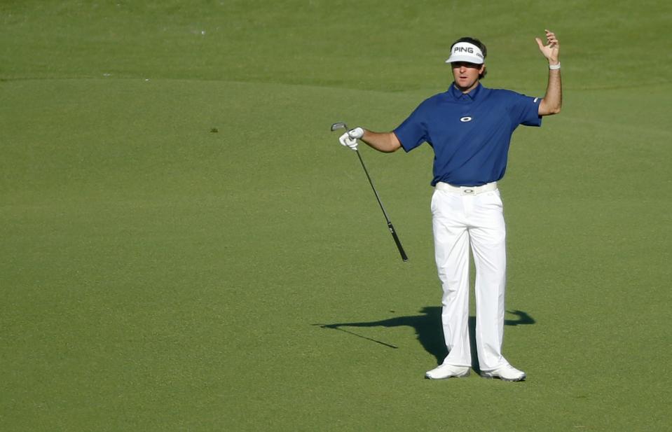 U.S. golfer Bubba watson reacts after a shot on the 15th hole during the third round of the Masters golf tournament at the Augusta National Golf Club in Augusta, Georgia April 12, 2014. REUTERS/Mike Blake (UNITED STATES - Tags: SPORT GOLF)