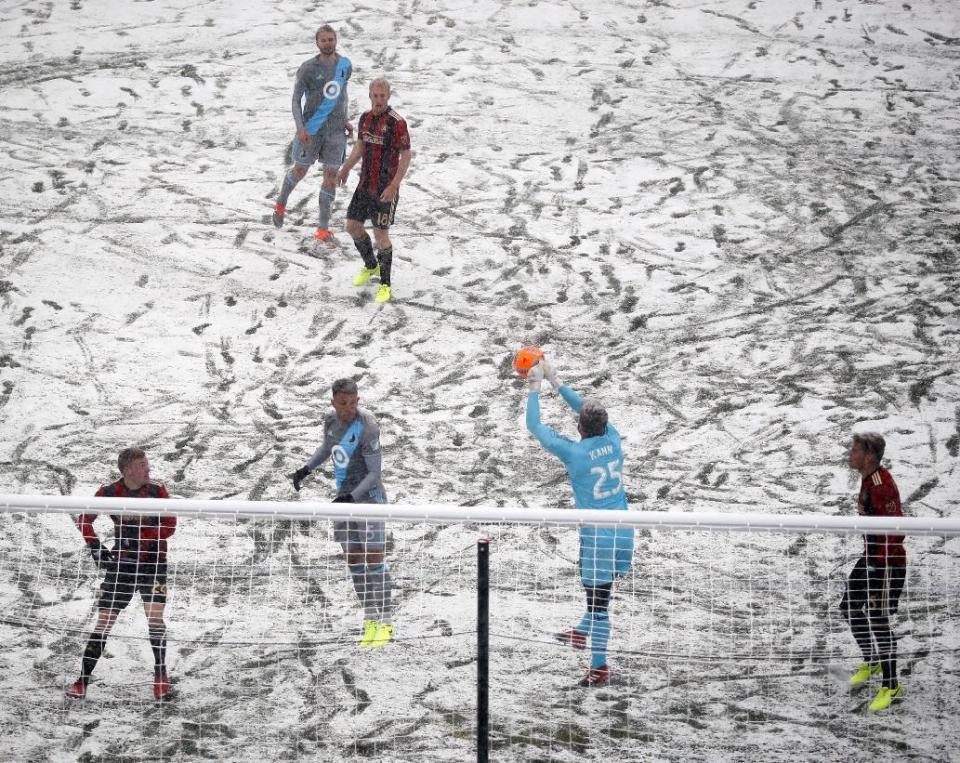 Atlanta United goalkeeper Alec Kann (25) makes a first-half save against a Minnesota United corner kick during an MLS soccer game Sunday, March 12, 2017, in Minneapolis, Minn. (Jeff Wheeler/Star Tribune via AP)