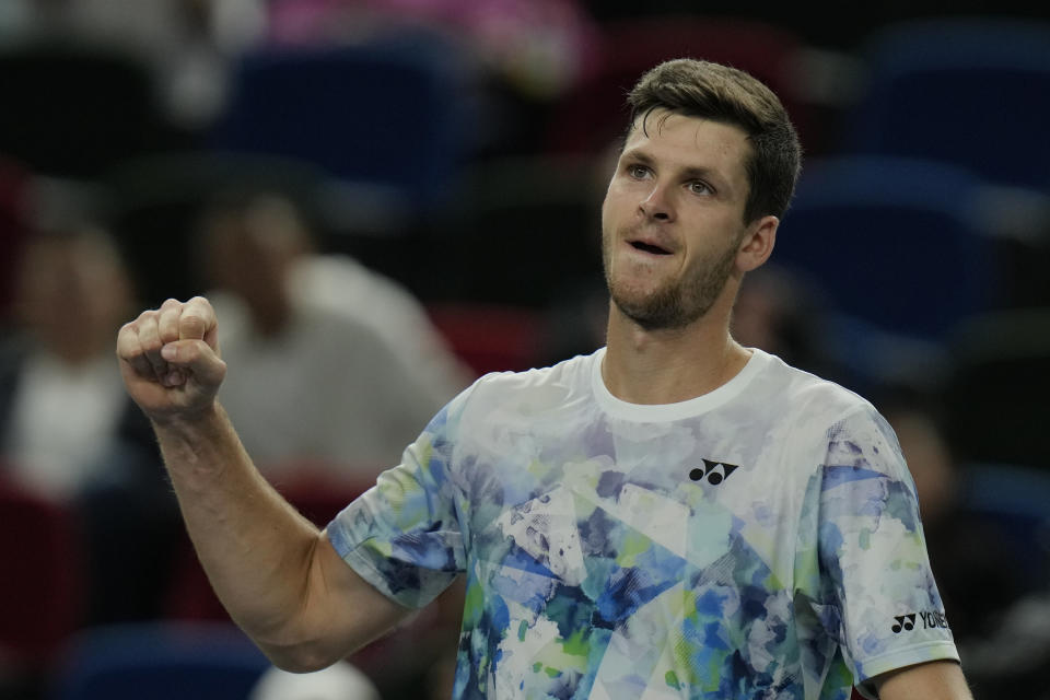 Hubert Hurkacz of Poland celebrates after defeating Fabian Marozsan of Hungary in the men's singles quarterfinal match of the Shanghai Masters tennis tournament at Qizhong Forest Sports City Tennis Center in Shanghai, China, Thursday, Oct. 12, 2023. (AP Photo/Andy Wong)