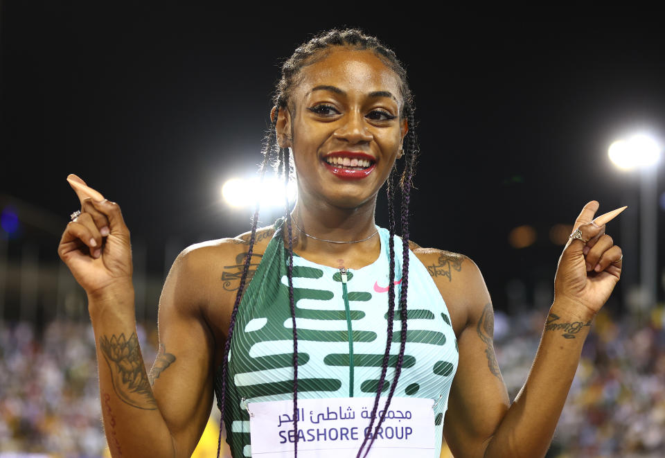 Sha'Carri Richardson celebrates after winning the women's 100m final on Friday in Doha. (Photo by Francois Nel/Getty Images)