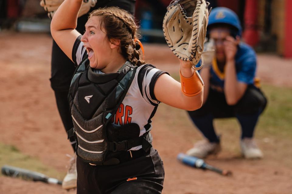 Strasburg's catcher Sydney Sibila reacts to the game-winning tag out at home plate during their Division 4 State Softball Championship game against Lincolnview Saturday, June 4 at Firestone Stadium in Akron.
