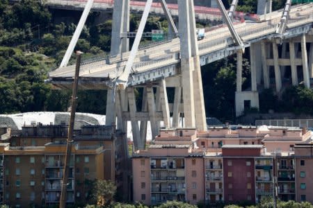 The collapsed Morandi Bridge is seen in the port city of Genoa, Italy August 16, 2018.  REUTERS/Stefano Rellandini