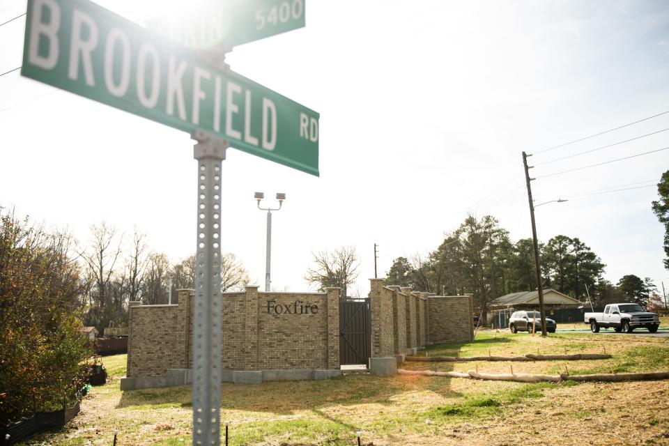 Piedmont Natural Gas, a subsidiary of Duke Energy, finished putting up a wall to conceal a gas regulator station that Foxfire neighbors had complained about.