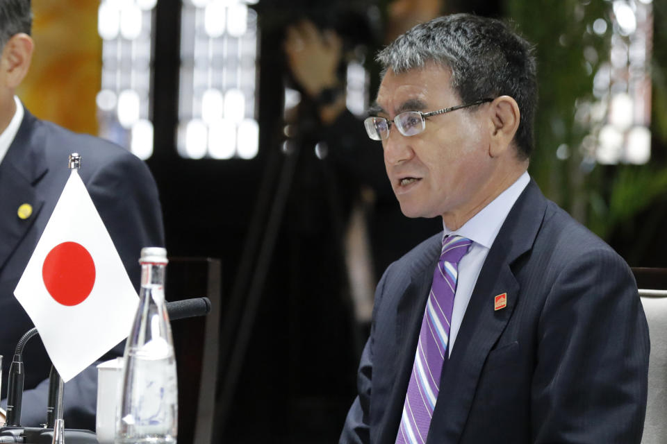 Japanese Foreign Minister Taro Kono speaks with his Chinese counterpart Wang Yi and South Korean counterpart Kang Kyung-wha during their trilateral meeting at Gubei Town in Beijing Wednesday, Aug. 21, 2019. (Wu Hong/Pool Photo via AP)