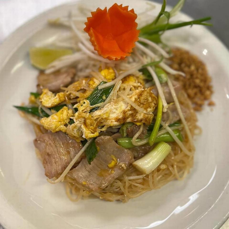 Pork pad thai is on the menu.