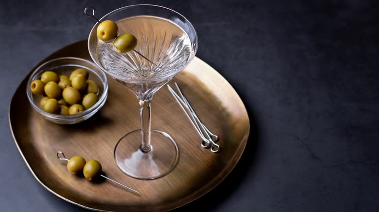 Dirty gin martini with olives