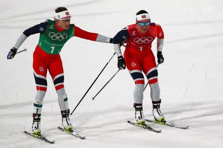 Cross-Country Skiing - Pyeongchang 2018 Winter Olympics - Women's Team Sprint Free Finals - Alpensia Cross-Country Skiing Centre - Pyeongchang, South Korea - February 21, 2018 - Marit Bjoergen and Maiken Caspersen Falla of Norway in action. REUTERS/Carlos Barria