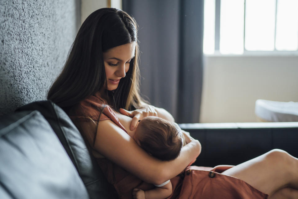 woman breastfeeding with nursing bras