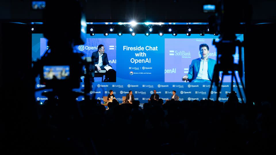 Kyunghyun Cho, professor of computer science and data science at New York University, from left, JP Lee, chief executive officer of Softbank Ventures Asia, Greg Brockman, president and co-founder of OpenAI, and Sam Altman, chief executive officer of OpenAI, during a fireside chat organized by Softbank Ventures Asia in Seoul, South Korea, on June 9. - SeongJoon Cho/Bloomberg/Getty Images