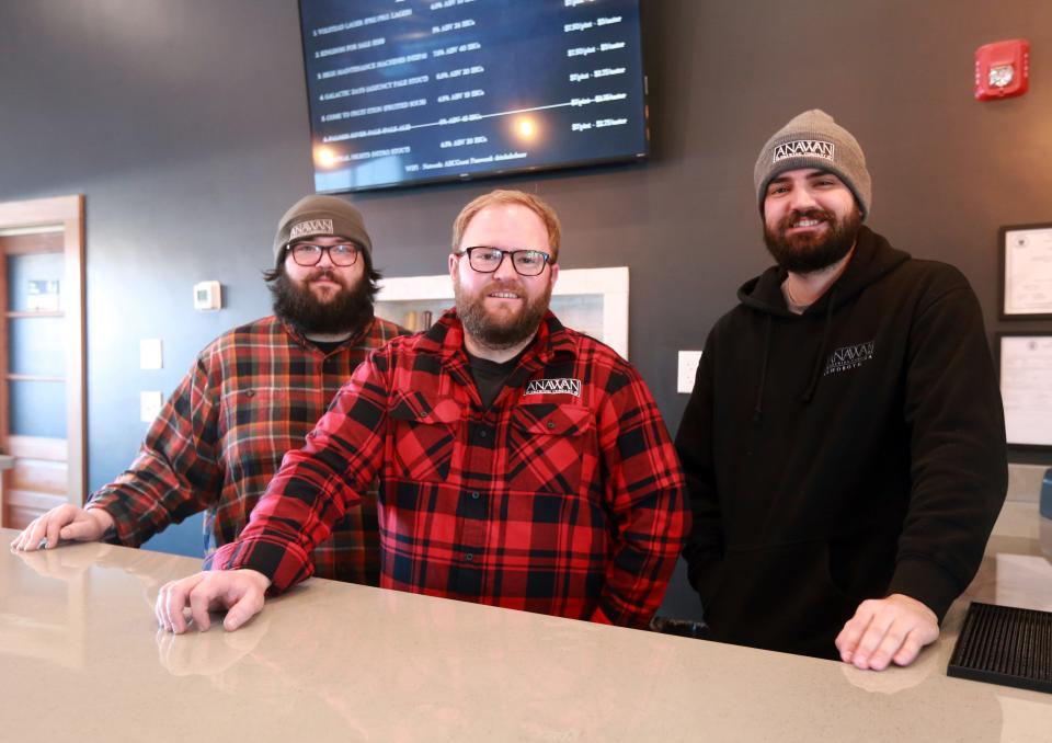 The staff at Anawan Brewing Company in Rehoboth, from left, brewer Dan DiRienzo, owner Steffen Johnson and bartender Max Boostrom on Saturday, Feb. 5, 2022.