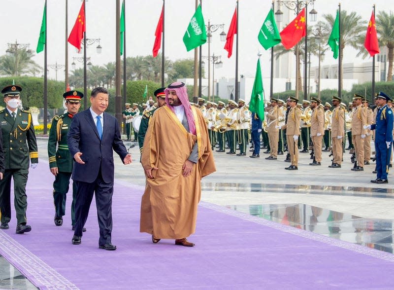 Saudi Crown Prince Mohammed Bin Salman greets Chinese President Xi Jinping in Riyadh, Saudi Arabia.