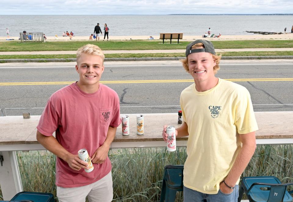 Cape Tide Hard Tea co-owners Ben Carbeau, left, and Peter Nelson, who founded the company with Ollie Cheever and Harrison Hill, are selling the vibe of a lazy summer afternoon, targeting a crowd mostly in their 30s.