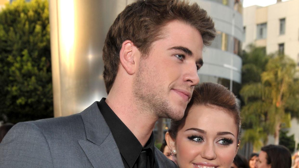 liam hemsworth and miley cyrus at the last song premiere