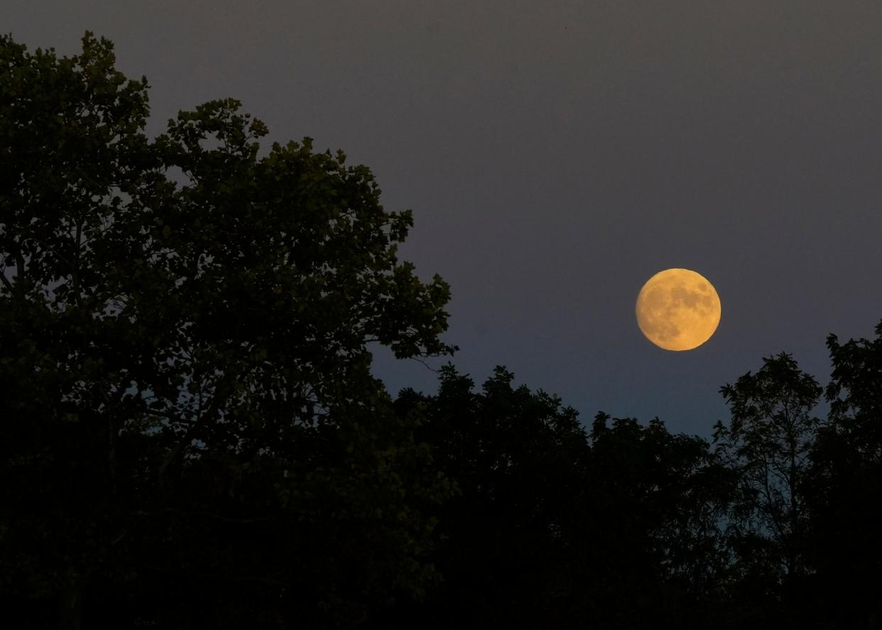 A nearly full moon rises over the Ohio History Connection's annual All Hallows' Eve at the Ohio Village on Oct. 8.