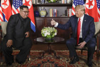 <p>Donald Trump gives North Korea leader Kim Jong Un a thumbs up at their meeting at the Capella resort on Sentosa Island Tuesday, June 12, 2018 in Singapore. (Photo: Evan Vucci/AP) </p>