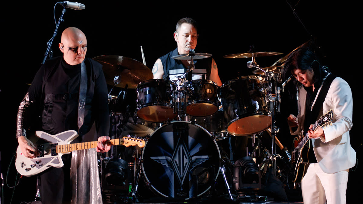  Billy Corgan, Jimmy Chambelin and James Iha of Smashing Pumpkins perform on stage at The SSE Arena Wembley on October 16, 2018 in London, England. 