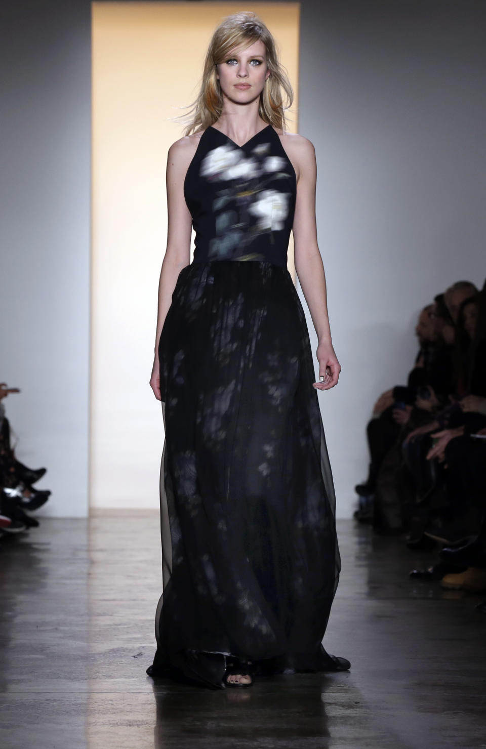 The Peter Som Fall 2014 collection is modeled during Fashion Week in New York, Friday, Feb. 7, 2014. (AP Photo/Richard Drew)