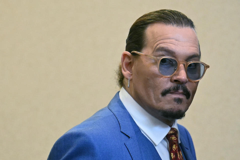 Actor Johnny Depp in the courtroom at the Fairfax County Circuit Courthouse in Fairfax, Va., Tuesday, May 24, 2022. Depp sued his ex-wife Amber Heard for libel in Fairfax County Circuit Court after she wrote an op-ed piece in The Washington Post in 2018 referring to herself as a "public figure representing domestic abuse." (Jim Watson/Pool photo via AP)