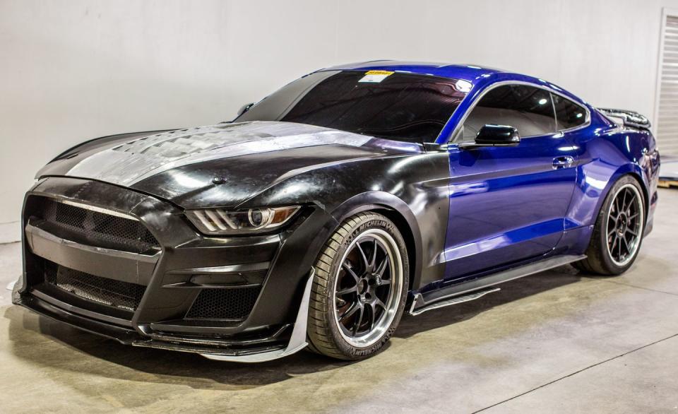 <p>At top speed, the GT4-borrowed airfoil of the Exposed Carbon Fiber Track package contributes to a net downforce of 440 pounds. The Handling package–equipped GT500s, with a Gurney flap attached to its hybrid spoiler-cum-wing "swing," develops about 220 pounds of total downforce. The base GT500 gets by with no downforce-aiding elements but the prize of being the quickest GT500 in a straight line, says Ford.</p>