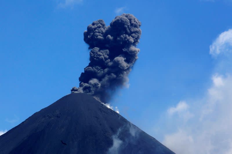 The Pacaya volcano spews smoke and ash as seen from El Rodeo