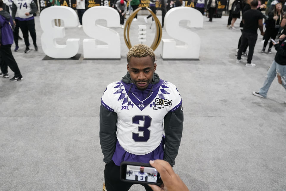 TCU safety Mark Perry poses for a photo during a media day ahead of the national championship NCAA College Football Playoff game between Georgia and TCU, Saturday, Jan. 7, 2023, in Los Angeles. The championship football game will be played Monday. (AP Photo/Marcio Jose Sanchez)