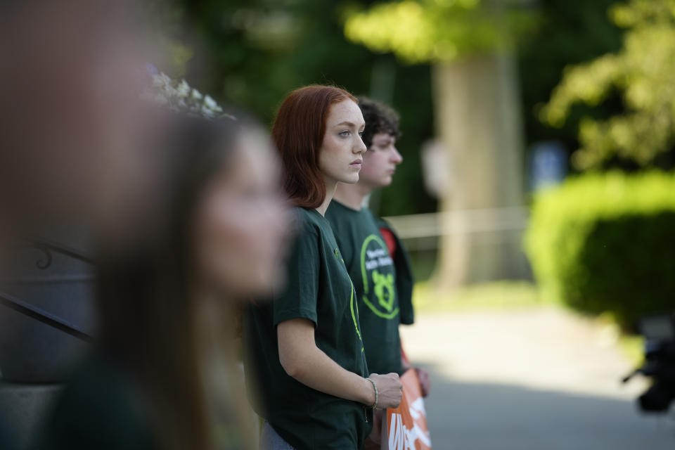 Ella Seaver, a survivor of the 2012 Sandy Hook Elementary School shooting, attends a rally against gun violence on Friday, June 7, 2024 in Newtown, Conn. (AP Photo/Bryan Woolston)