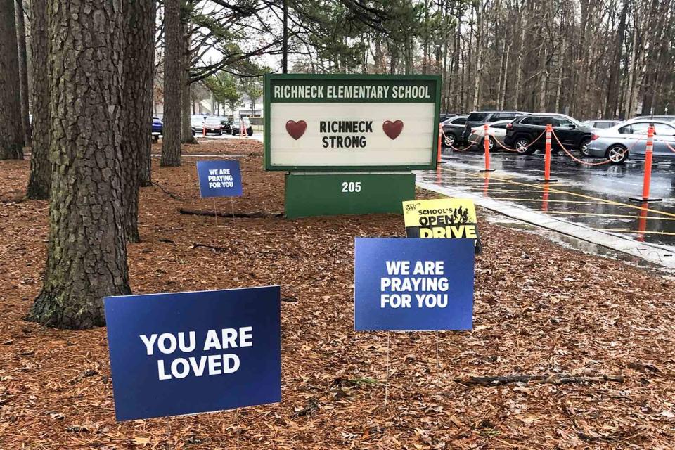 <p>AP Photo/Denise Lavoie</p> Signs outside Richneck Elementary School in Newport News, Va. in 2023