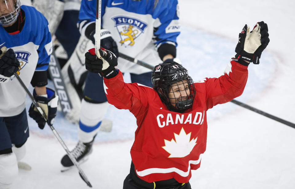 Canada's Jamie Rattray celebrates her goal against Finland during the second period of an IIHF women's hockey championships game in Calgary, Alberta, Friday, Aug. 20, 2021. (Jeff McIntosh/The Canadian Press via AP)