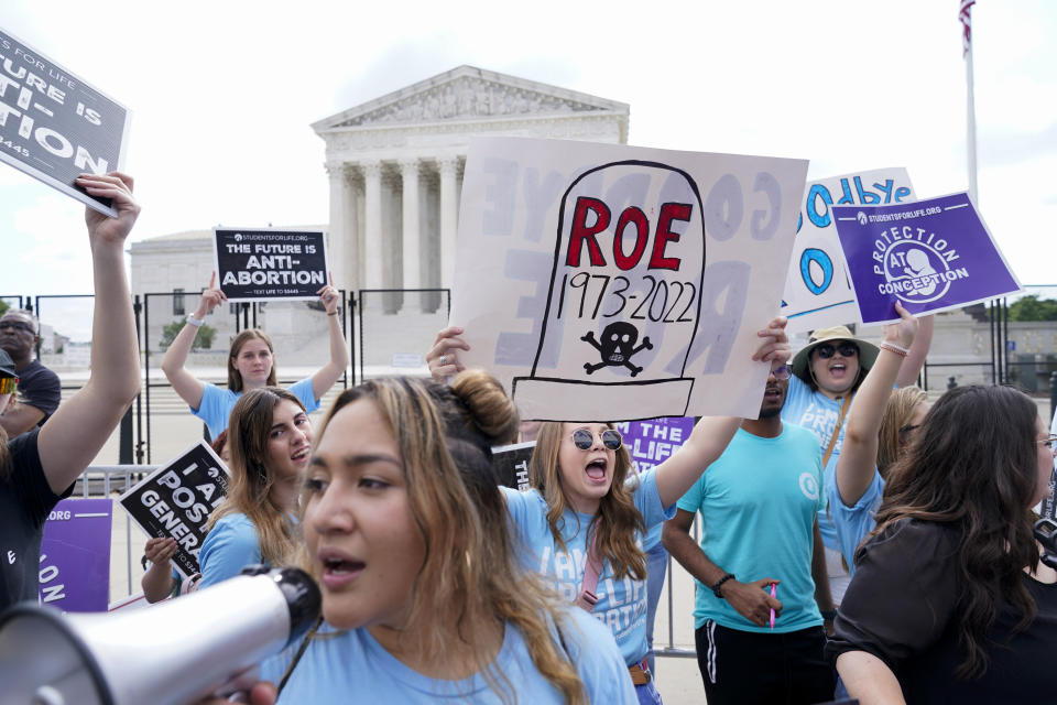 Demonstrators protest about abortion outside the Supreme Court in Washington, Friday, June 24, 2022. (AP Photo/Jacquelyn Martin)