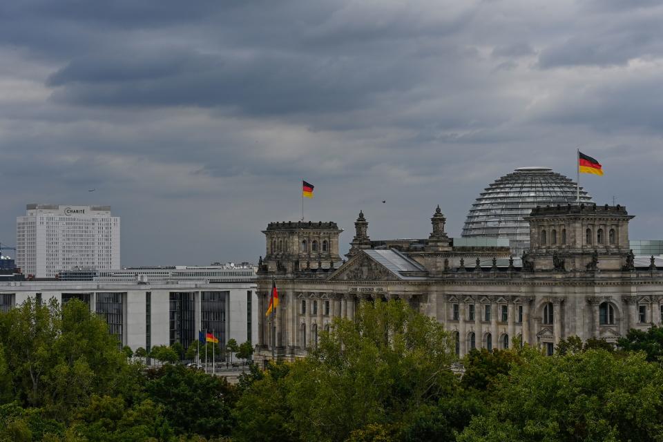 The Reichstag building which houses the Bundestag (lower house of parliament) is picturd with the Charite hospital in the background in Berlin, on September 9, 2020. (Photo by Tobias SCHWARZ / AFP) (Photo by TOBIAS SCHWARZ/AFP via Getty Images)