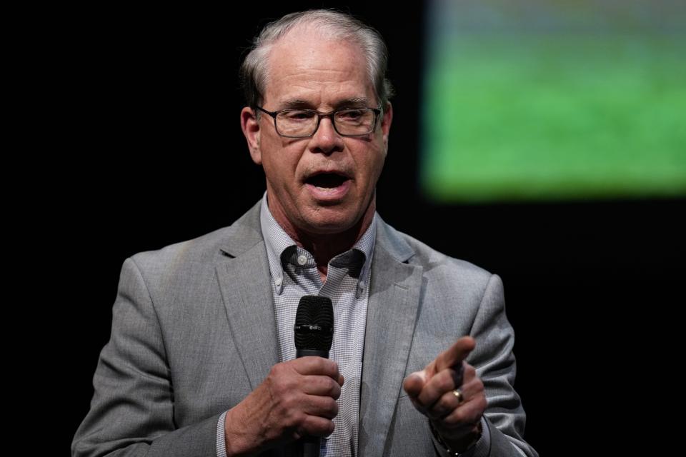 FILE - Sen. Mike Braun, R-Ind., speaks during a Republican Indiana gubernatorial candidate forum in Carmel, Ind., Jan. 25, 2024. The day after his primary victory,Braun announced state Rep. Julie McGuire as his pick for lieutenant governor. Four of the past five lieutenant governors in Indiana have been women. But none have successfully won the state's top executive office. (AP Photo/Michael Conroy, File)