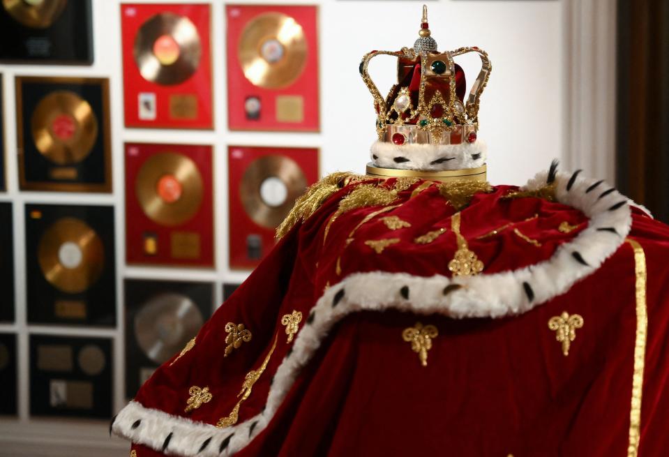 Freddie Mercury's signature crown and cloak ensemble, worn throughout Queen's 1986 Magic Tour, is pictured during a press preview ahead of the "Freddie Mercury: A World of His Own" auctions, at Sotheby's auctioneers in London on Aug. 3, 2023. The ensemble is set to go for 60-80 thousand pounds ($76,000-101,000). Sotheby's are set to present the items over six auctions from Sept. 6-11.