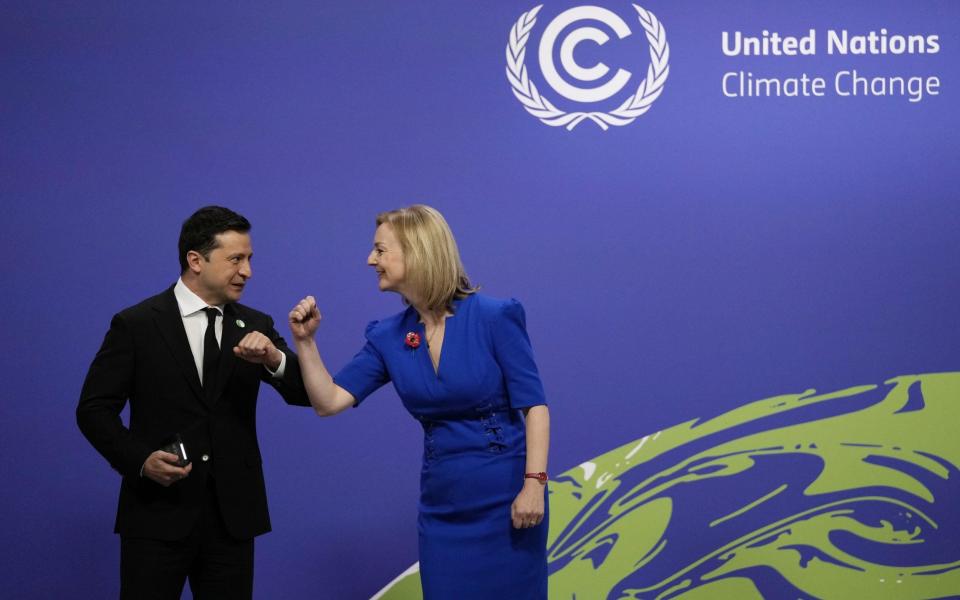 Liz Truss and Volodymyr Zelensky at the Cop26 summit in Glasgow, in November 2021 - Alastair Grant/PA