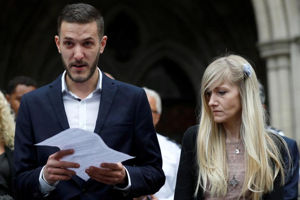 Chris Gard and Connie Yates speaking outside court on Monday (Reuters)