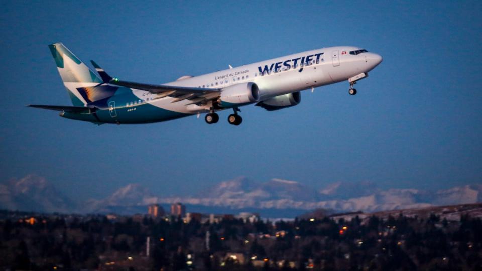 A WestJet flight from Calgary to Vancouver, which is the first commercial flight of the Boeing 737 Max in Canada since the aircraft was cleared to fly again in Canadian airspace, lifts off in Calgary on Jan. 21, 2021.