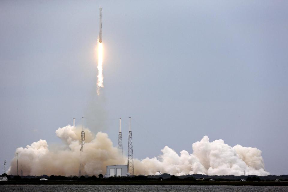 A rocket carrying the SpaceX Dragon ship lifts off from launch complex 40 at the Cape Canaveral Air Force Station in Cape Canaveral, Fla. on Friday, April 18, 2014. The mission will deliver research equipment, food and other supplies to the International Space Station. (AP Photo/John Raoux)